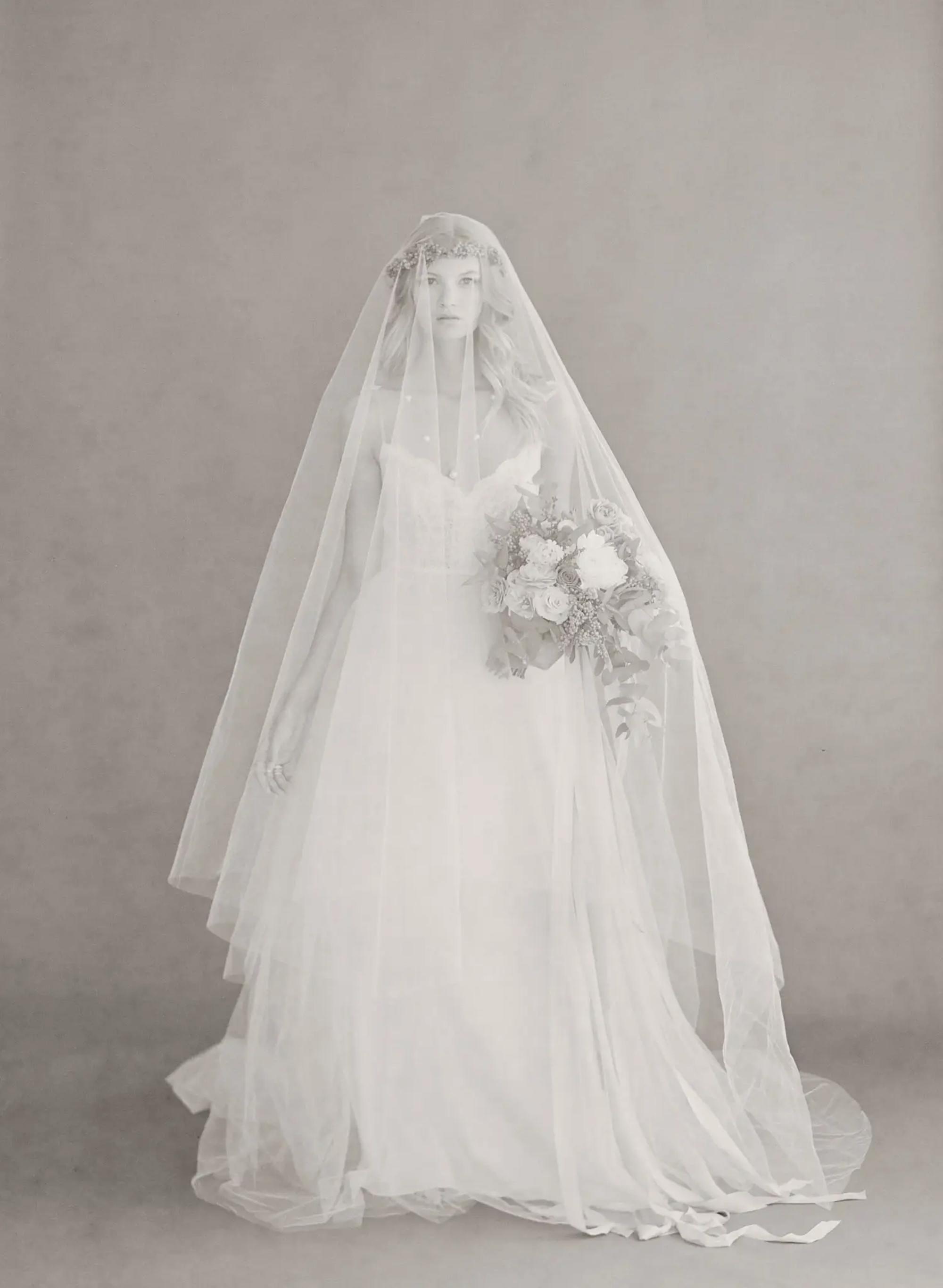 https://unveiledlittlerock.com/uploads/images/products/2503/Twigs-and-Honey_668-Wide-Cathedral-Veil-w-Extra-Long-Blusher_LIGHT-IVORY_108Lx104W-x54B_0.webp?w=2000